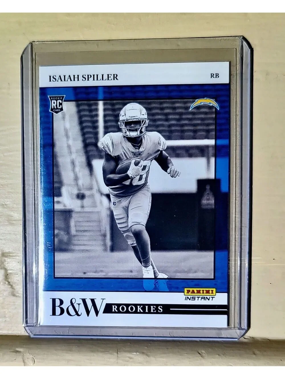 Isaiah Spiller 2022 Panini NFL Black & White Rookies #34 Football Card 1 of 649